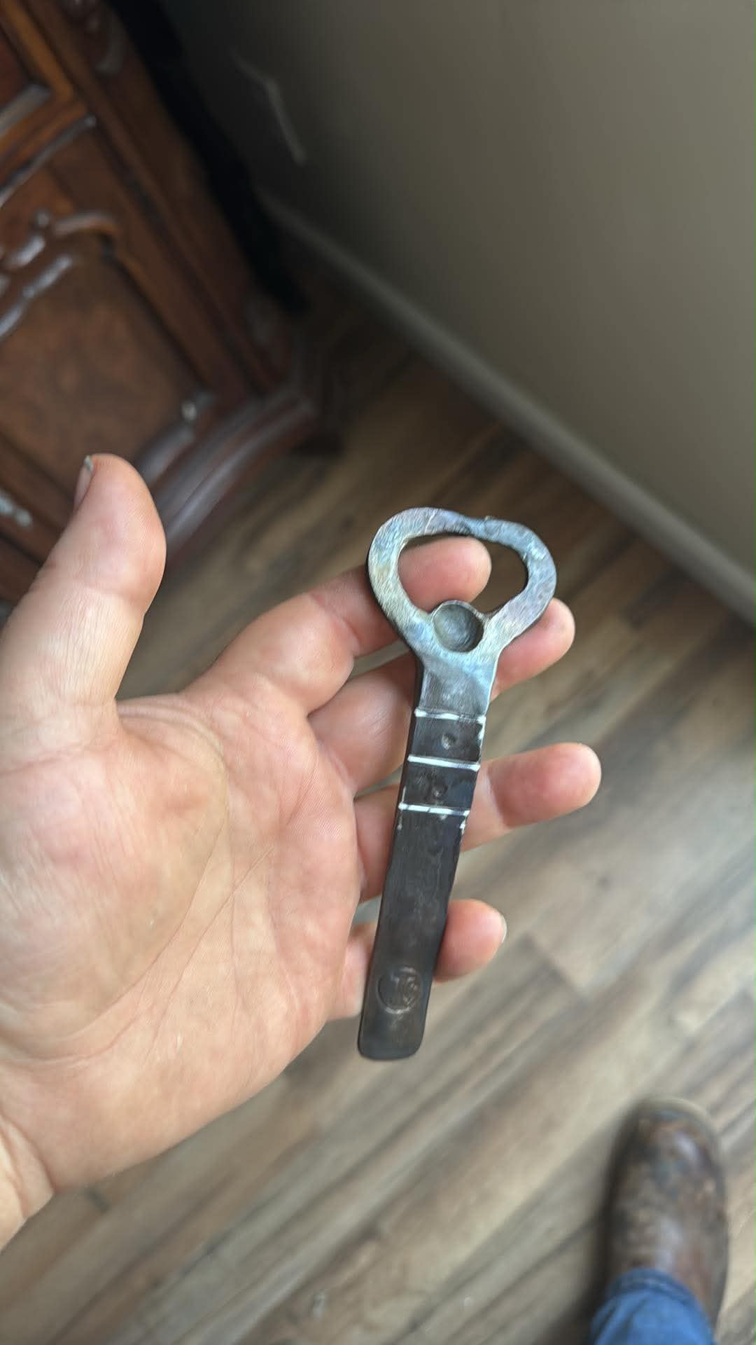 Finished hand-forged bottle opener